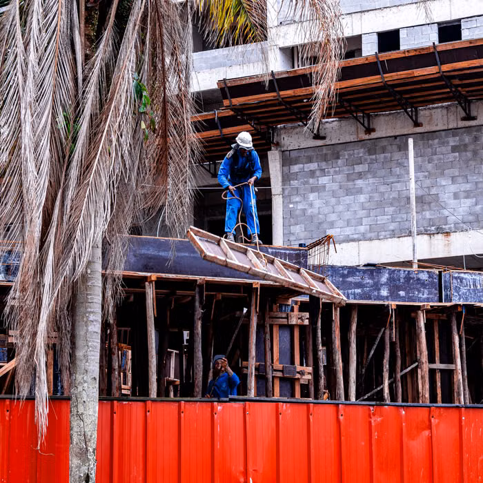 Projects construction team working on a property exterior