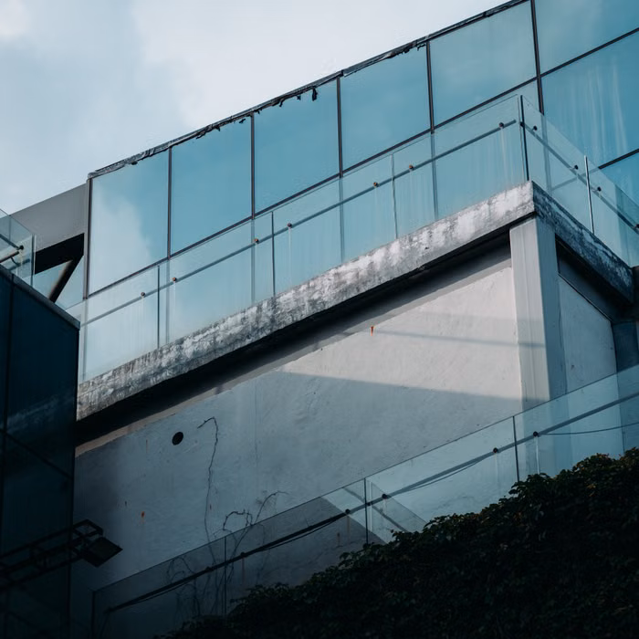 Projects technician inspecting water intrusion in a building
